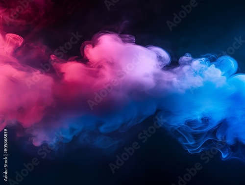 Vivid pink and blue smoke intertwining against a dark background.