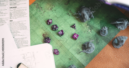  Miniatures and dice for adventure story on battle map role playing tabletop game and board games hobby