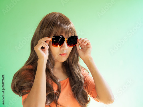 Woman Sunglasses Brown Hair Lifestyle Travel Summer Tropical, Young People Face Skin Tan Model on Blue Wall with Overlay Sun, Portrait Girl Pretty Posing, Eye patch Pterygium Surgery Eye Medical