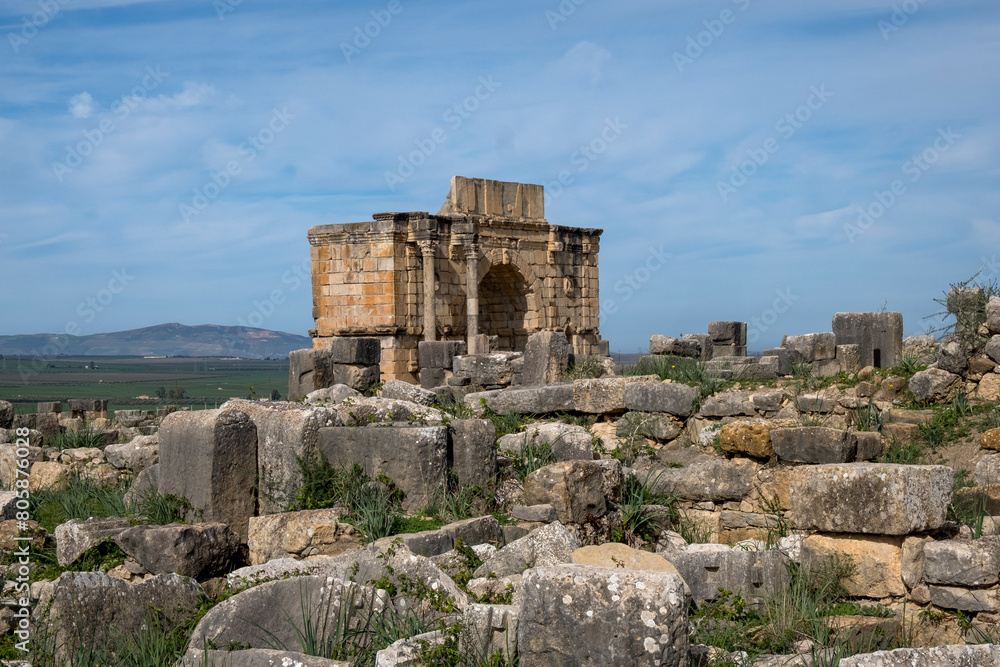 Arch of Triumph, panoramic view of Roman Archaeological Site of Volubilis, UNESCO World Heritage Site, Morocco
