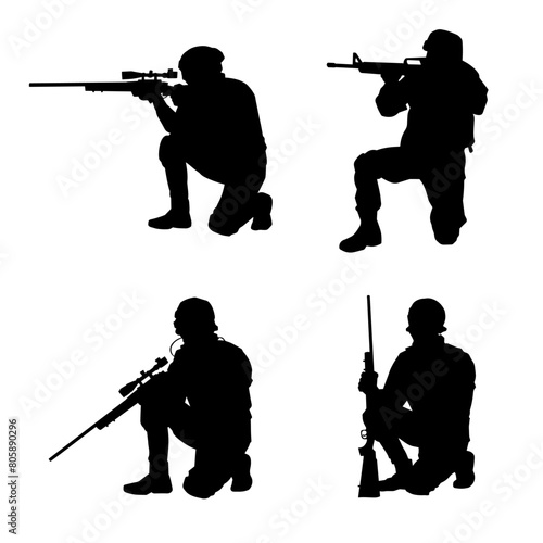 Silhouette of a shooter in squat position. Silhouette of a male soldier in action pose with his machine gun.