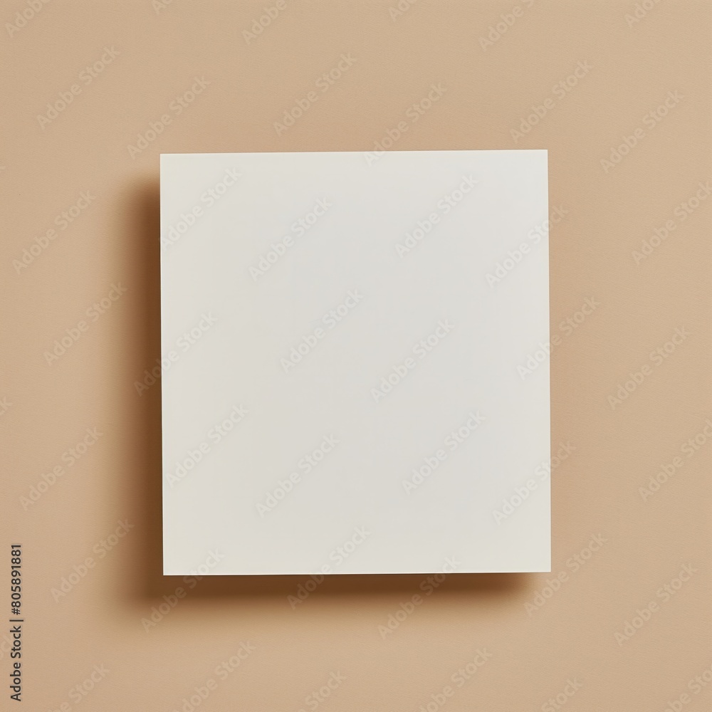 Blank White Square Paper on Beige Background Blank White Square Paper on Beige Background