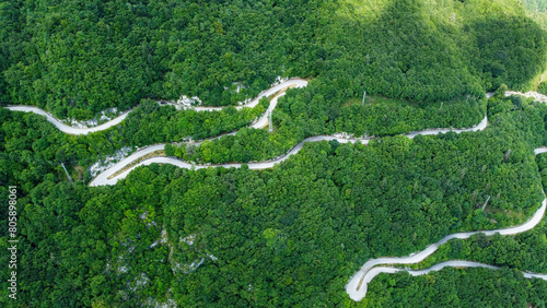 Photography mountain road amidst the greenery of uncontaminated nature
