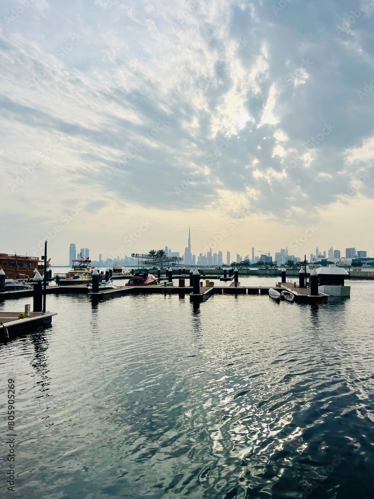 Modern city harbor with buildings and skyscrapers silhouette background