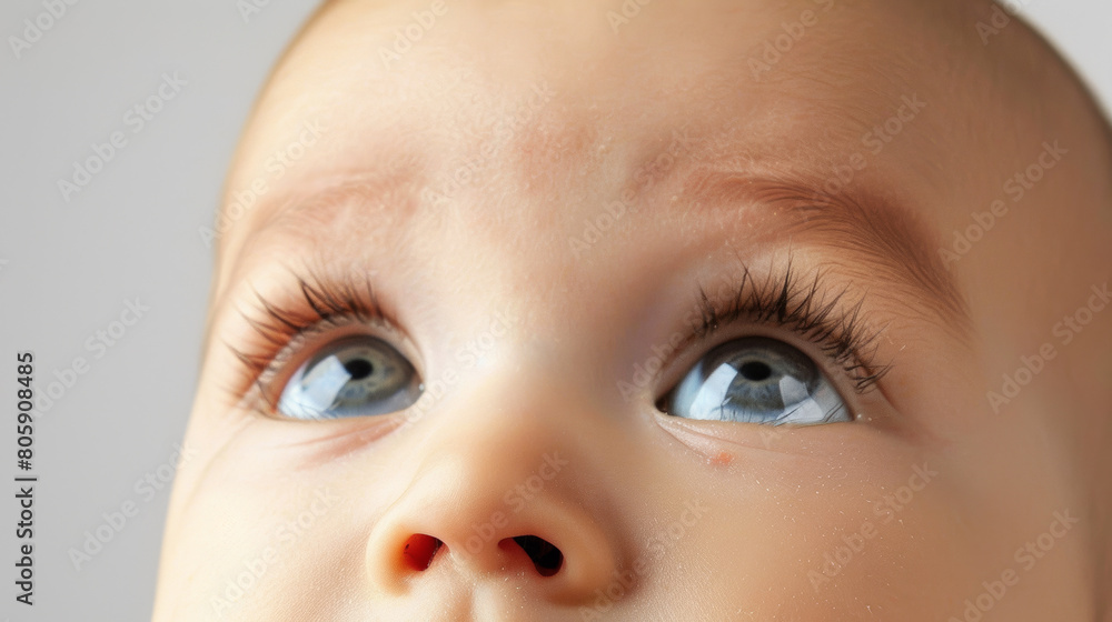 baby eyes looking up with curiosity baby eyes looking up with curiosity
