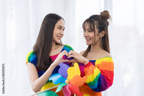 Lgbtq Concept. Two Young women rainbow colored dress.