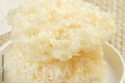 Close up,Dried snow fungus (Tremella fuciformis) on white background