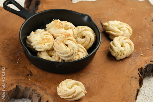 Kue Sagu Keju or Cheese Sago Cookies is Indonesian Traditional Cookies made from combination of sago flour and coconut milk.ussually prepared in ied fitr day. photo