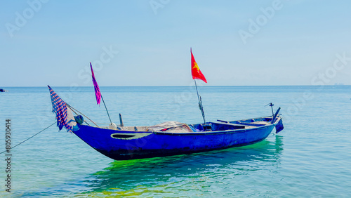 Fishing boat on cristal clear water in cham island  vietnam