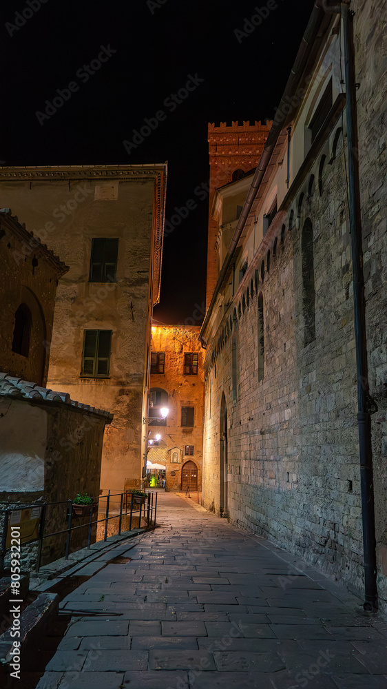The night streets of the medieval city Albenga, Savona, Italy.