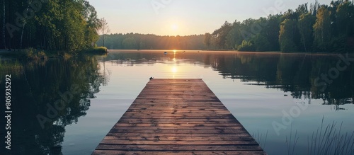 Panoramic of wooden dock overlooking a lake at sunset. generative AI image photo