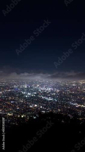 Wallpaper Mural Vertical video - Night aerial timelapse of Sapporo city Torontodigital.ca