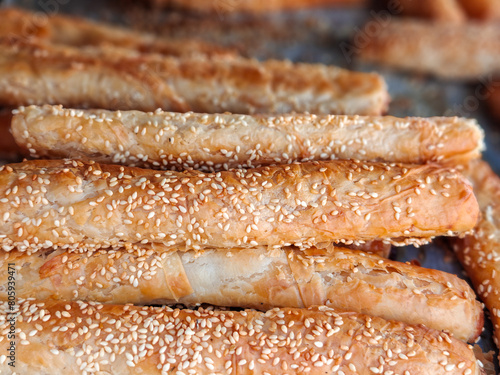 Fresh sesame bread sticks sold at local city market photo