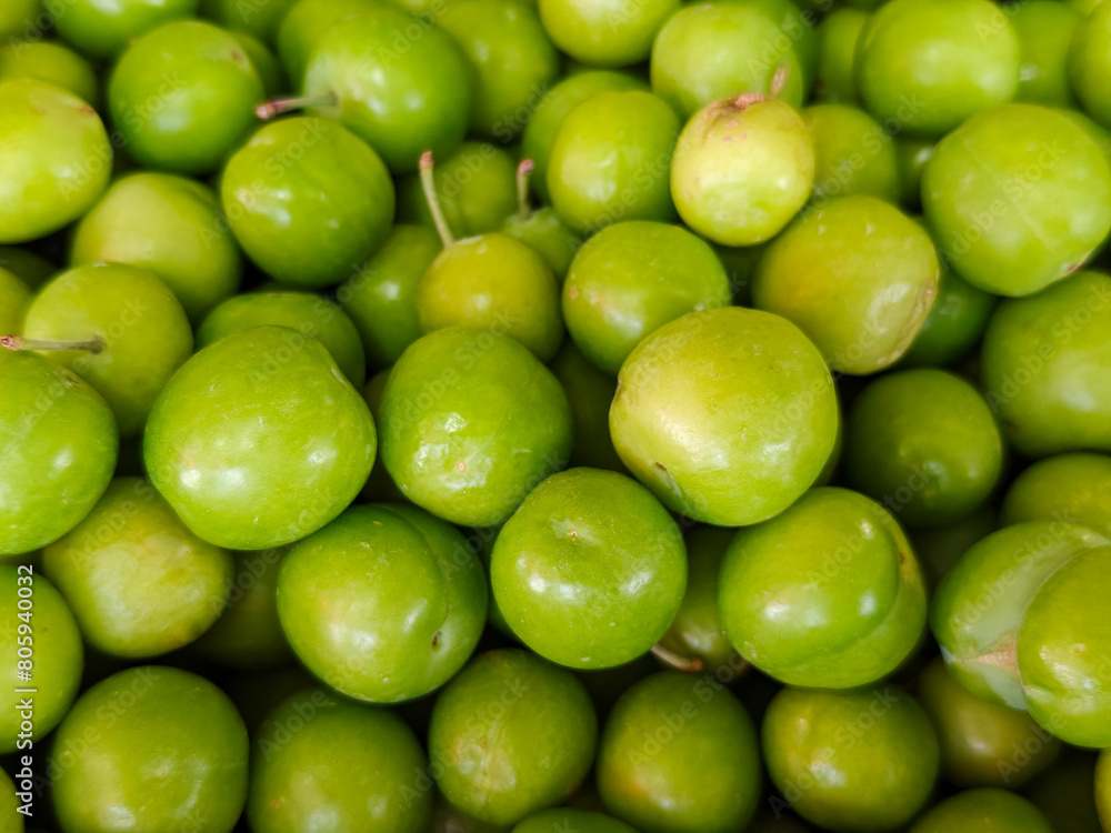 Fresh Myrobalan or cherry plum for sale at the local city market Fresh Myrobalan or cherry plum for sale at the local city market