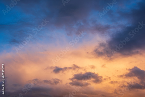 Fototapeta Naklejka Na Ścianę i Meble -  Stunning dramatic colorful stormy landscape sunset sky with lovely moody contrast in the clouds