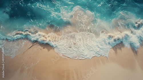 Aerial view of a vibrant beach scene with waves crashing onto the shore  showcasing the dynamic interaction between sea and sand