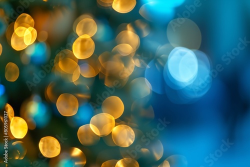 Christmas holiday background with defocused silhouette of Christmas tree glowing light bokeh lights