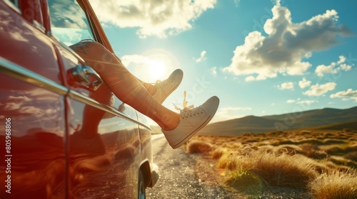 Feet sticking out of a car window against a desert backdrop during a road trip, emphasizing freedom and the joy of travel. Concept of exploration, leisure, and adventure.
 photo