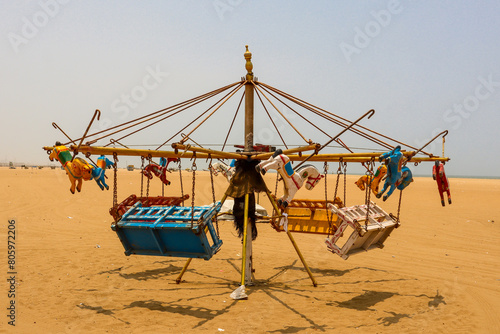 abandoned carousel carnival ride 
located Marina Beach, Chennai, India
5th May 2024