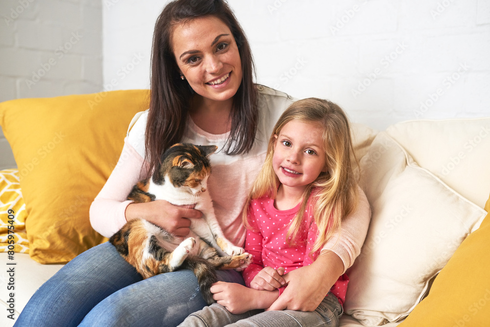 Mother, child and cat pet in portrait on couch at home for hug, embrace and relationship in house. Woman, daughter and family on sofa in lounge for support, love and development while together Mother, child and cat pet in portrait on couch at home for hug, embrace and relationship in house. Woman, daughter and family on sofa in lounge for support, love and development while together