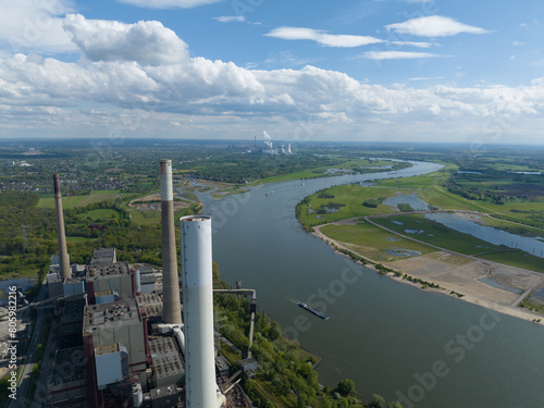 The Ruhr area is a highly industrialized region in the German state of North Rhine Westphalia. Rhine river and industrial powerplant. important places are Duisburg , Essen , Bochum , Dortmund