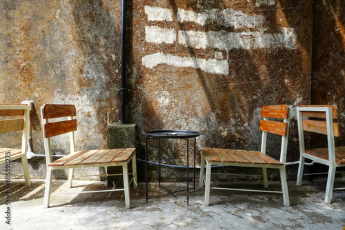 Wooden table with chair in the garden. For outdoor cafe or restaurant layout