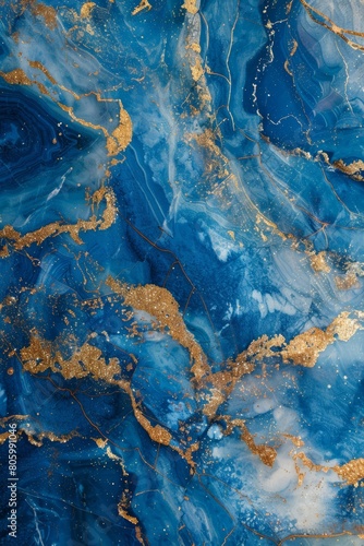 A high-resolution images of marble texture with blue and intertwined veins of gold and silver glitter. 