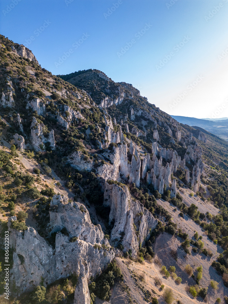 Naklejka premium Frares of Quatretondeta, Serrella mountain on evening light, Costa Blanca, Quatretondeta, Alicante, Spain - stock photo