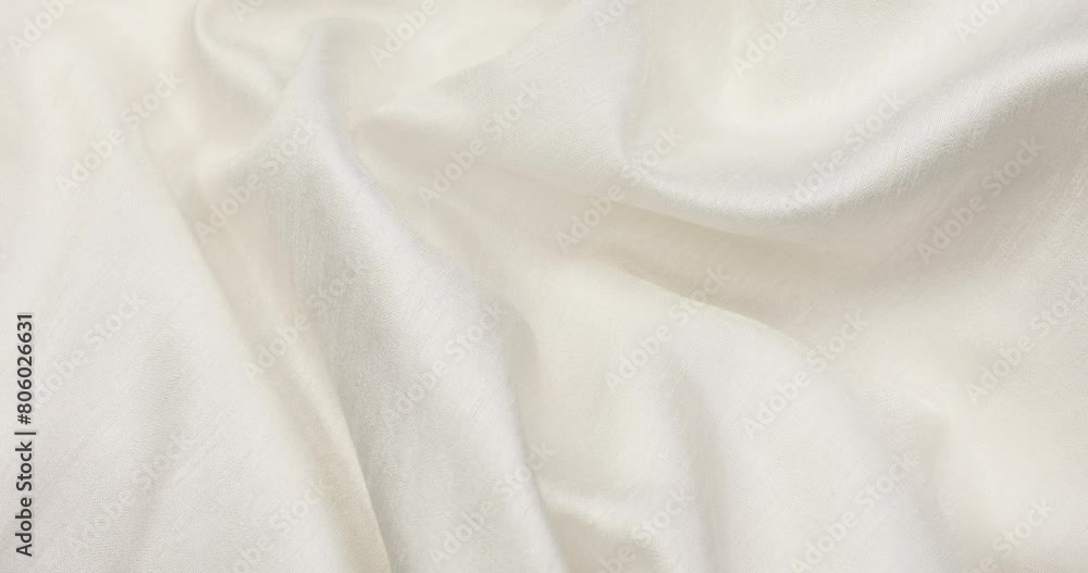 White fabric background. White cloth waves background texture. White fabric cloth textile material. White fabric background. White cloth waves background texture. White fabric cloth textile material.