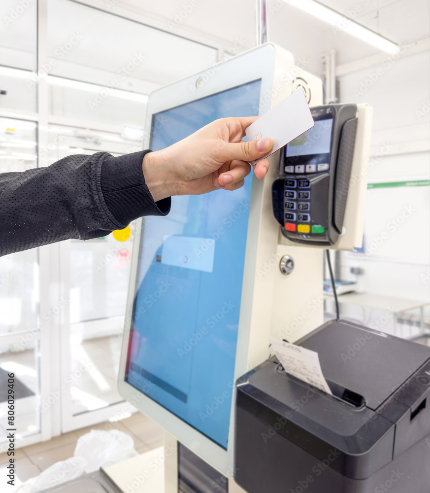 Customer pays his purchase at the supermarket,self checkout systems in retail stores,Barcode scanner,Self checkout machine Customer pays his purchase at the supermarket,self checkout systems in retail stores,Barcode scanner,Self checkout machine
