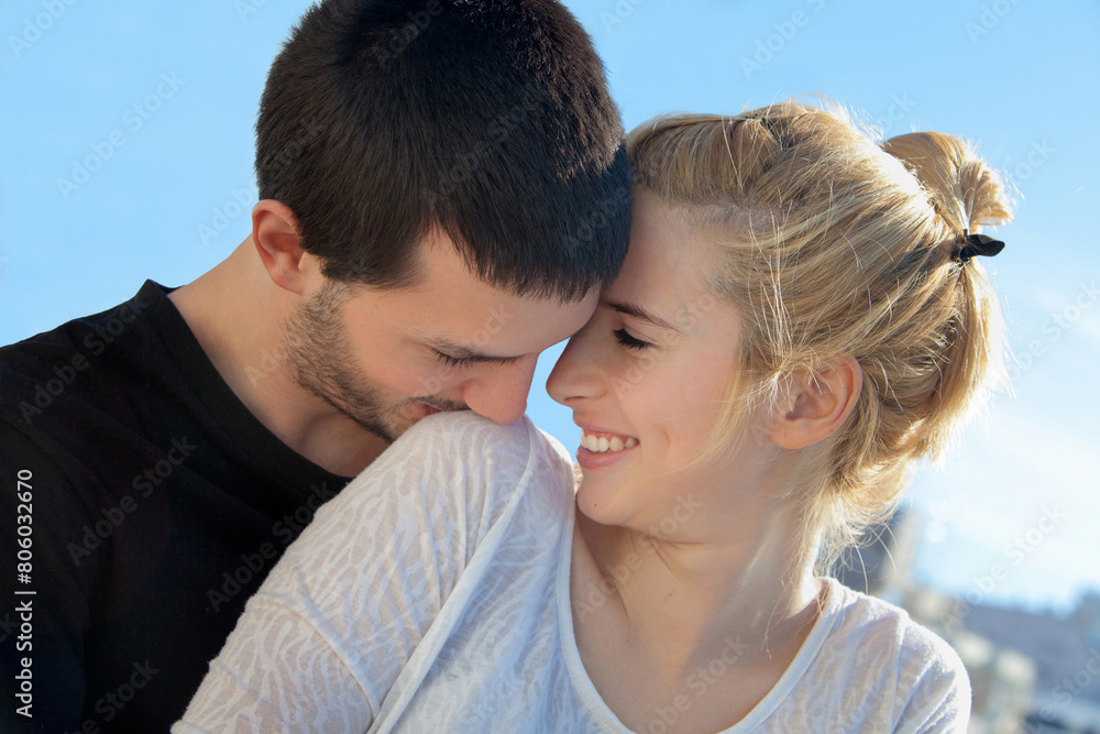 portrait of a young couple in love outdoors portrait of a young couple in love outdoors