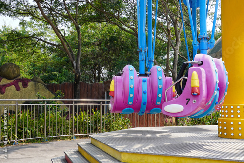 The swing ride is empty of fans and abandoned by its fans