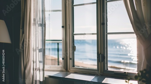 Cozy beachfront cottage, close-up of window with sea view, morning light, serene © Thanthara