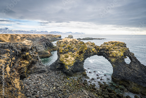 Gatklettur rock arch and cliffs near the town of Arnarstapi on Iceland's Snæfellsnes Peninsula photo