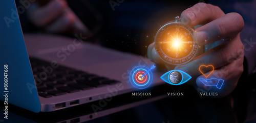 Wallpaper Mural Purpose business concept. Corporate communications to specify policy and business direction. Businessman holding compass to show glowing neon line of mission, vision, values icons. Torontodigital.ca