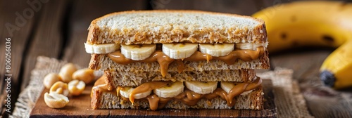 Delicious Peanut Butter and Banana Sandwich on Whole Wheat Bread. Nutty, Low Calorie photo