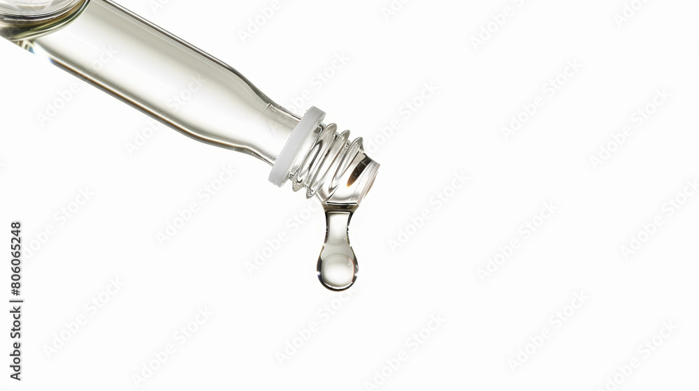 essential oil dropping from syringe, isolated