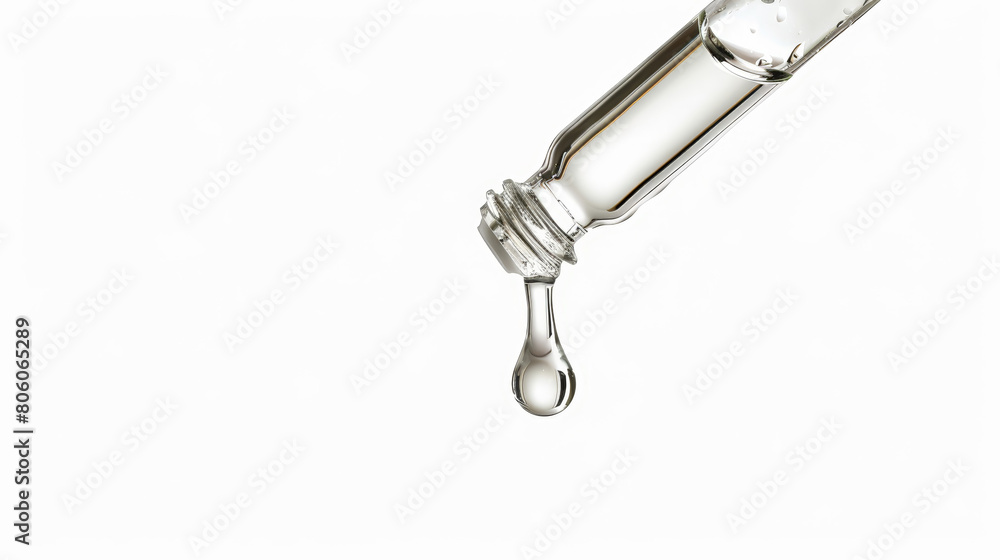 essential oil dropping from syringe, isolated essential oil dropping from syringe, isolated