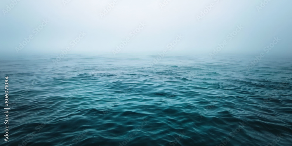 Obraz premium blue sea with waves and clouds , blue ocean with fog, nature background