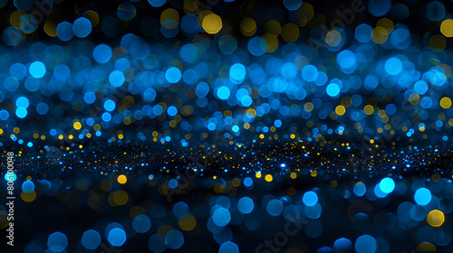  blue and gold particles. Bokeh background, Abstract blur black bokeh background, Texture, pattern, background Gaussian blur, Out of focus. Bright colored spots, convenient for the designer photo