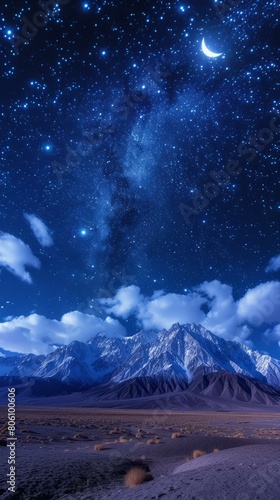 starry night sky over snow mountains in the desert