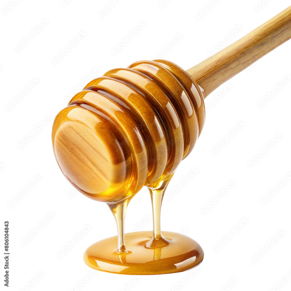 Golden honey flows from a wooden dipper Golden honey flows from a wooden dipper