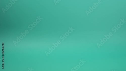Unrecognizable researcher's hand with latex glove holding empty titration flask during laboratory experiment.