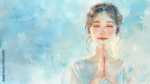 Delicate watercolor illustration showing a woman with her hands folded in prayer, her expression serene, against a washedout, light blue background photo