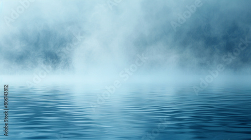 Softly diffusing smoke in a tranquil blue, gently enveloping the entire frame, suggesting the calm of an early morning fog over a lake.