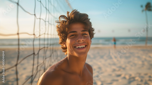 Athletic Teenage Boy Smiling by Beach Volleyball Net on Sunny Summer Day, Copy Space for Text