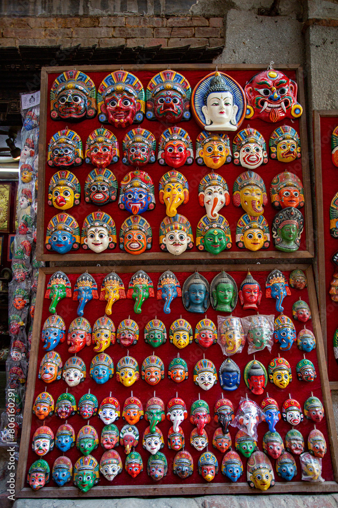Traditional handcrafted masks and souvenirs for sale in street shop of Kathmandu, Nepal