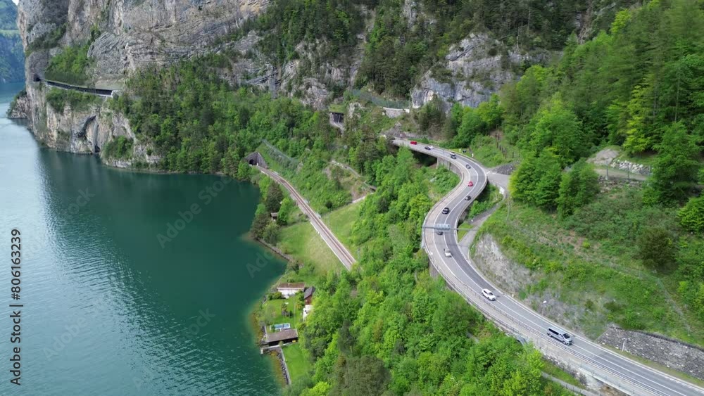 Mountainous Road with Traffic and Lake Mountainous Road with Traffic and Lake