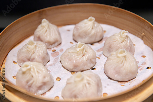 Savory Shanghai Xiaolongbao in Bamboo Steamer, the Essence of Chinese Dim Sum