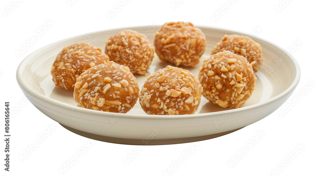 Laddu dessert on oval plate isolated on a white background